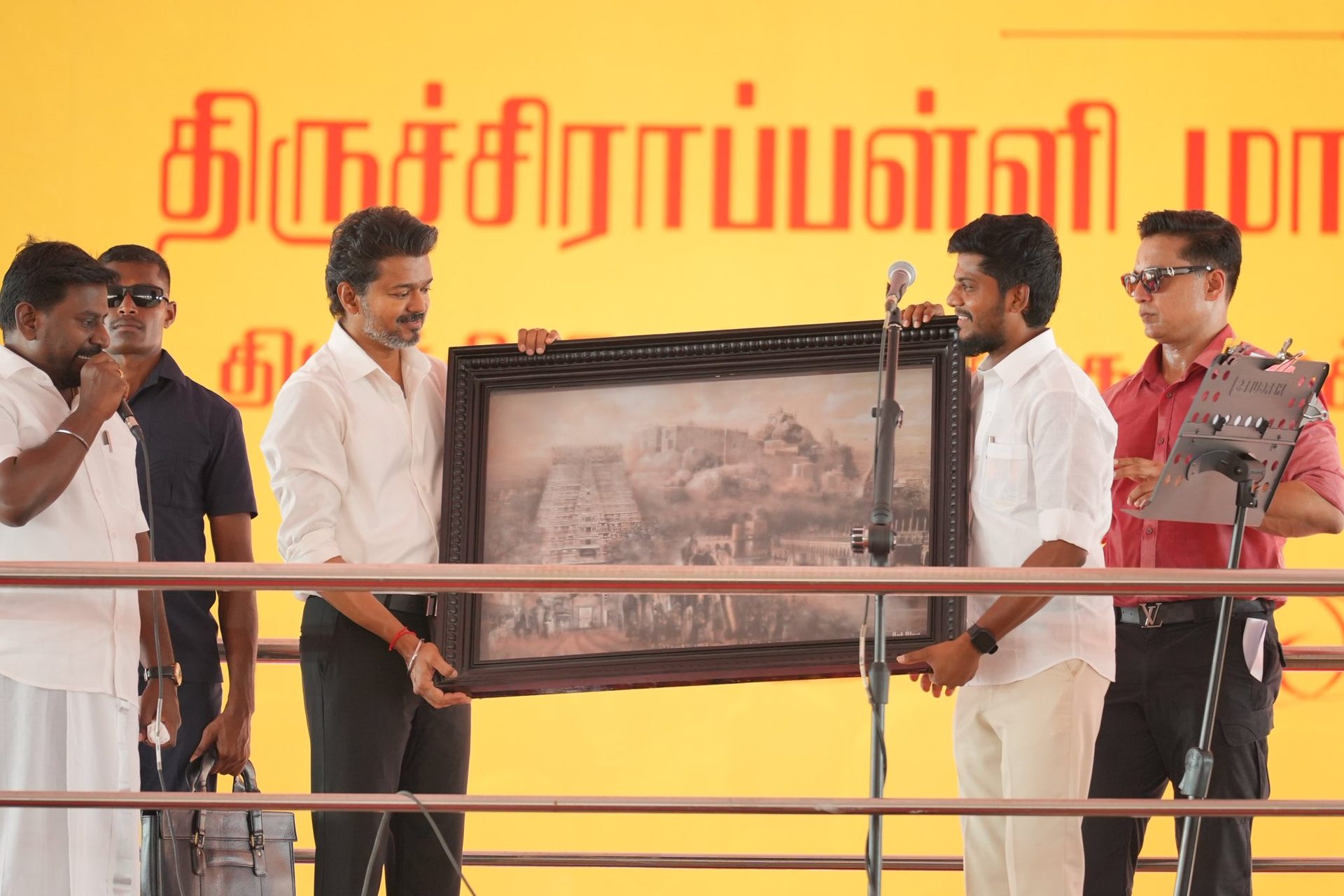 Presenting a framed view of Srirangam to CM Vijay - Trichy District Meeting
