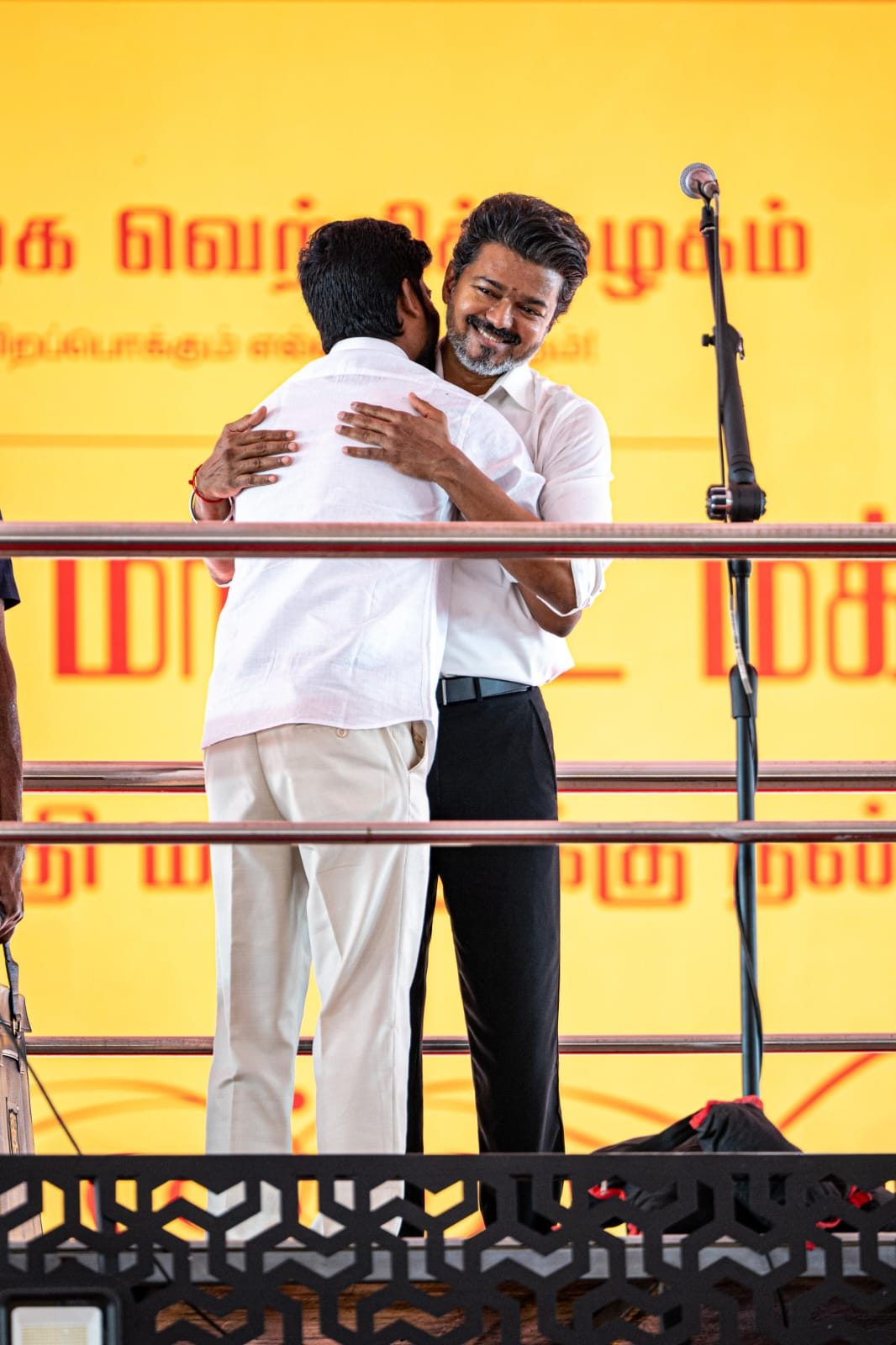 A warm embrace with CM Vijay on stage